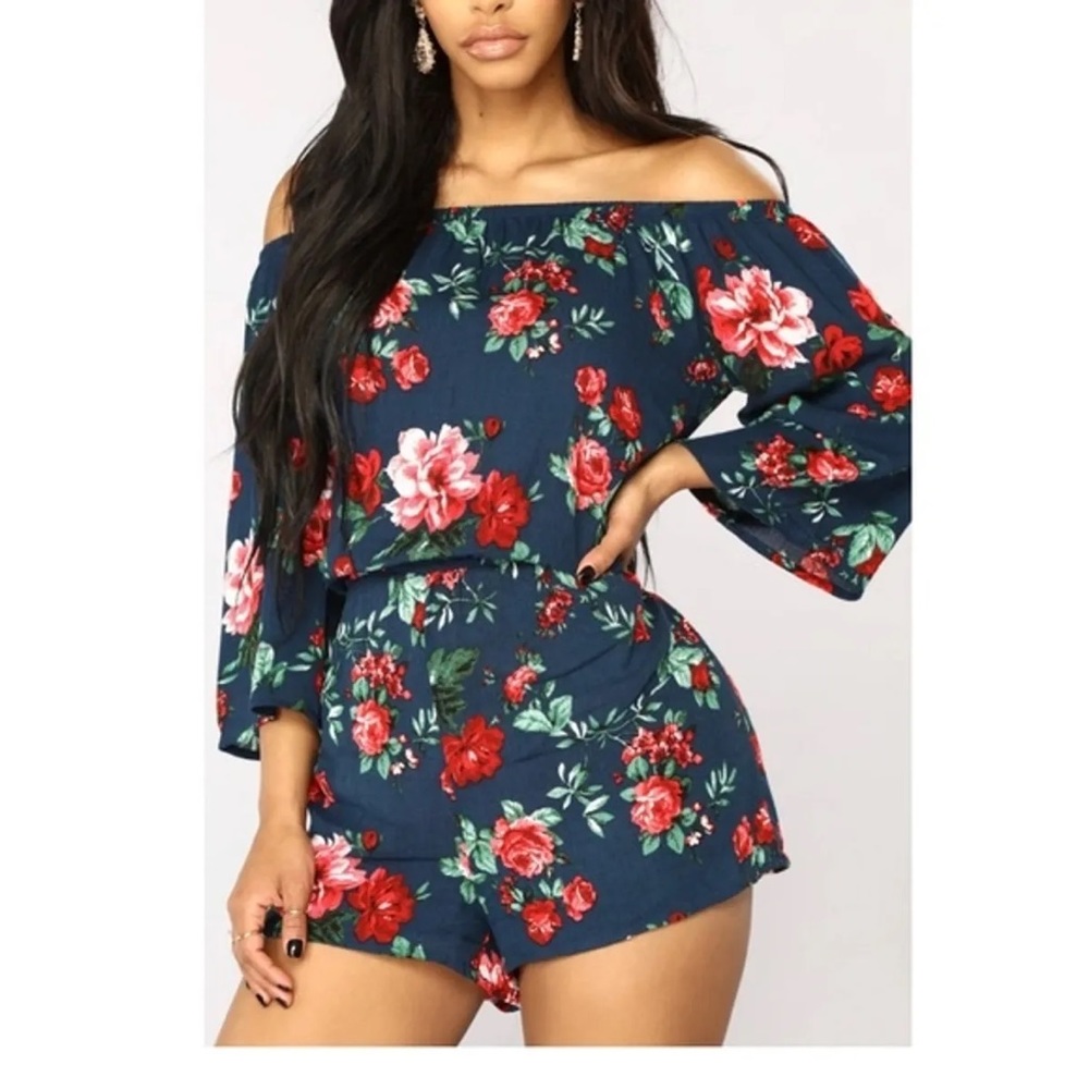 Ambiance blue floral romper! Size Medium! In excellent condition!